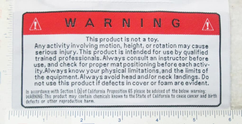 13-9118_Warning-FactoryProof Woven Labels - Taffeta Warning Label