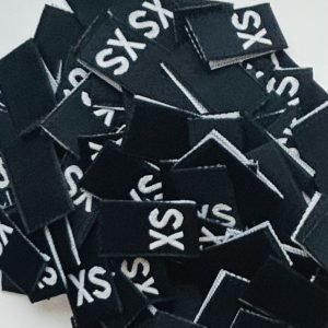 white on black woven size labels - lot