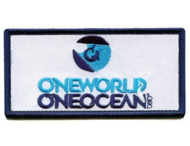 embroidered sticker being pressed onto fabric