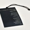 black hang tags with string