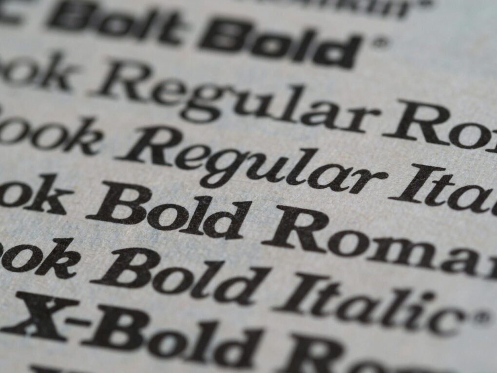 pexels-photo-5045981-5045981 Detailed view of different font styles printed on paper, showcasing typography.