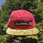 red hat with custom pvc labels sewn on front