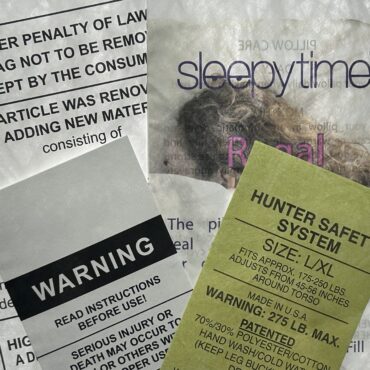 Custom Tyvek clothing and furniture label with warning text
